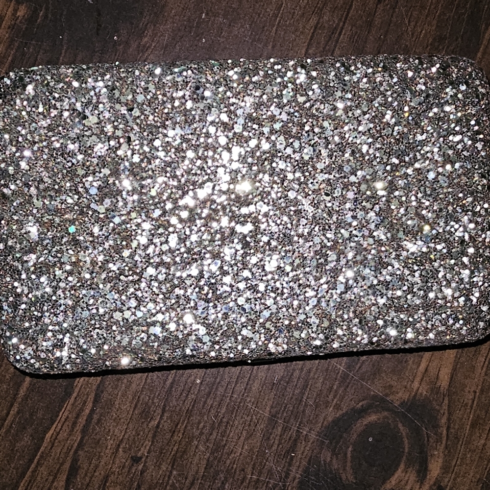 Small gold sparkling hard shell clutch